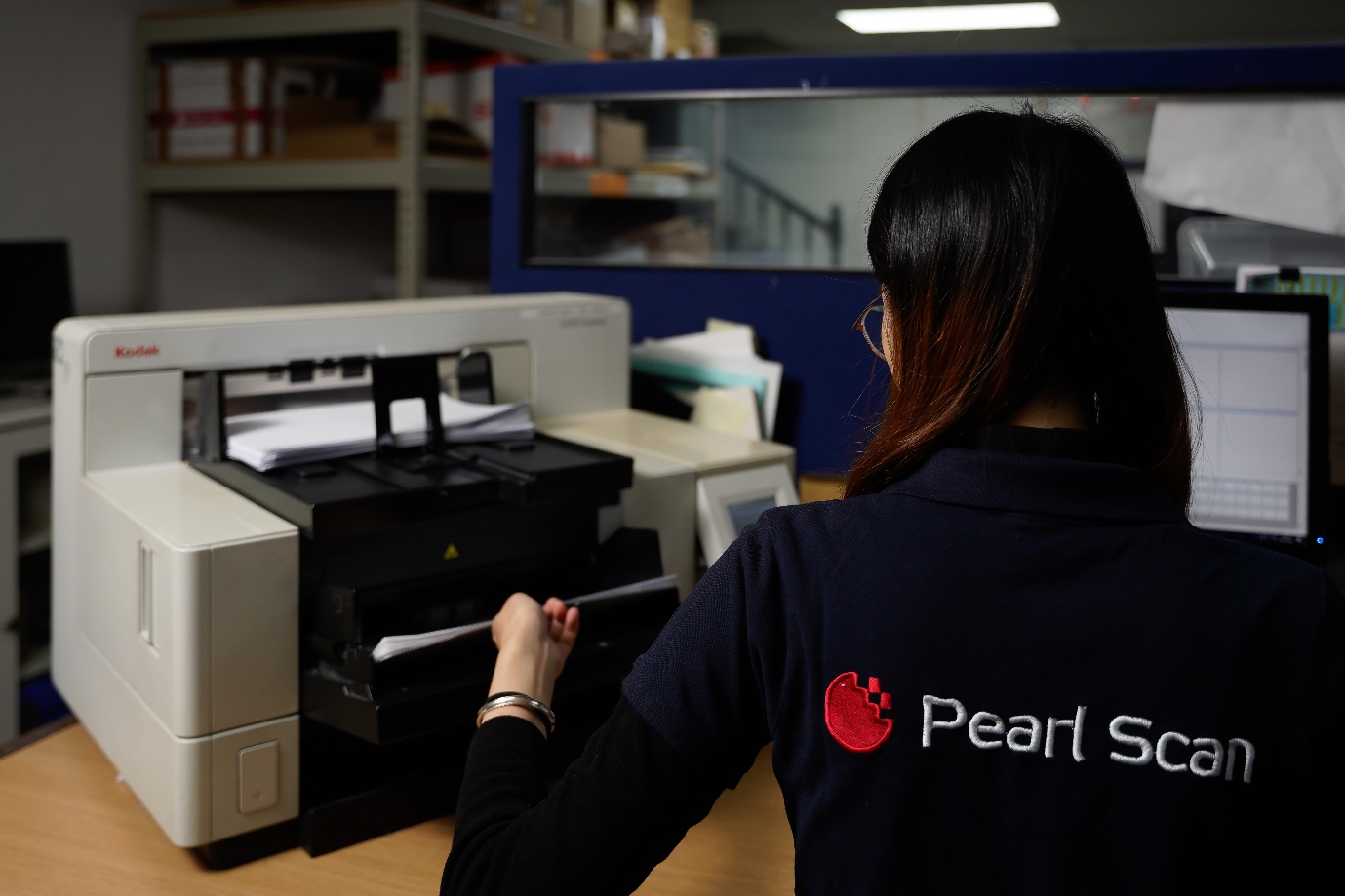 A person using a printer AI-generated content may be incorrect.